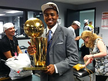 Teon holding Spurs championship trophy (front office staff)
